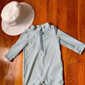 Baby swim suit and hat perfect condition